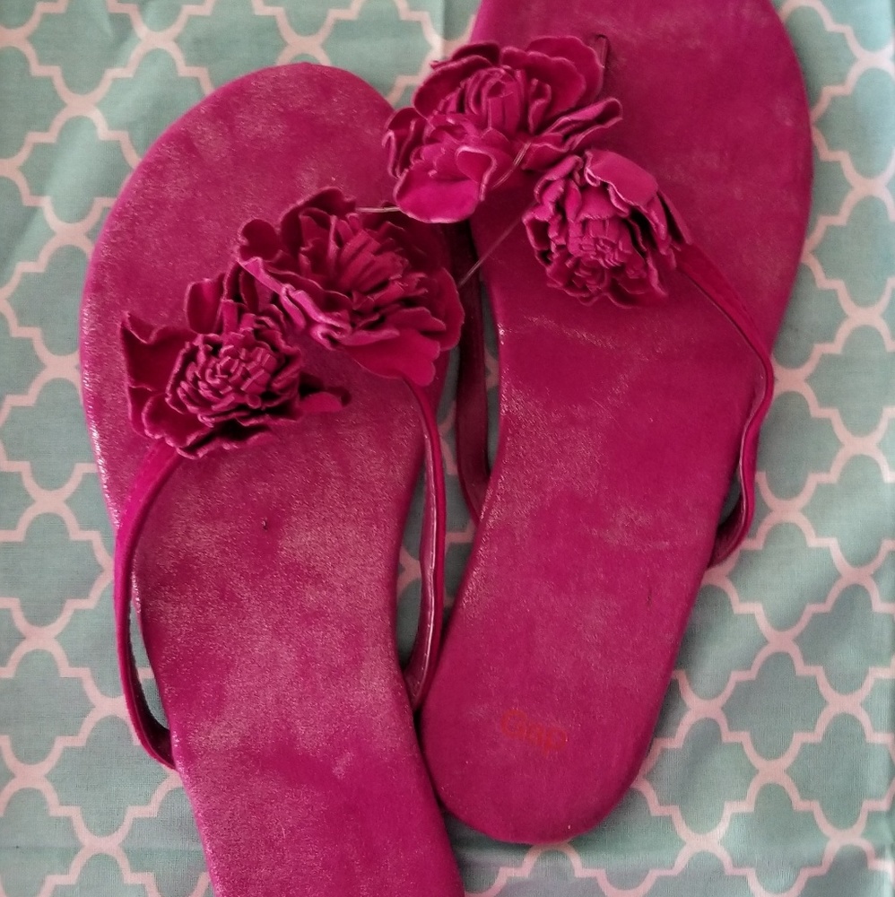 Magenta Gap flower flip flops
